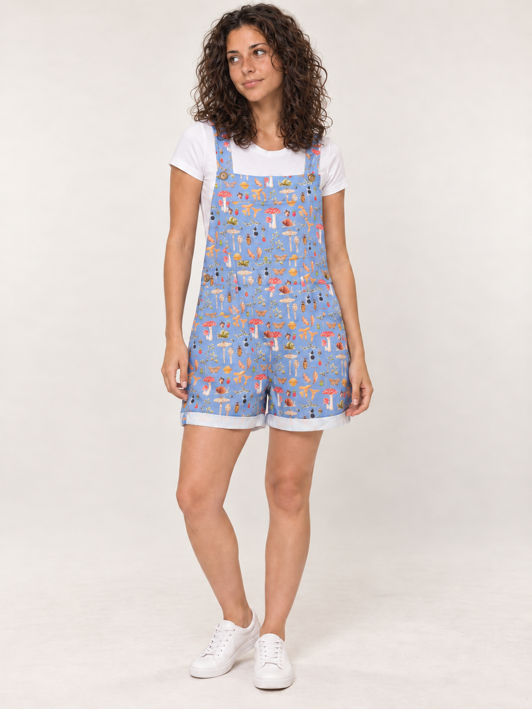 Model wearing Woodland Mushroom Short Overalls Blue, full-body front view