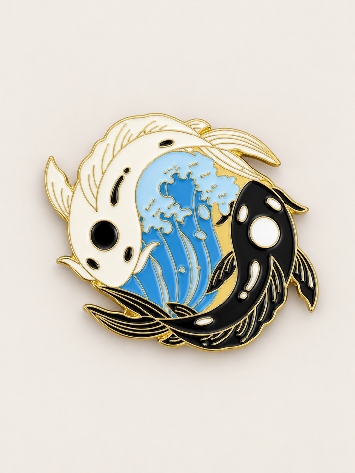 Yin Yang Koi Wave Pin shown on a warm neutral background