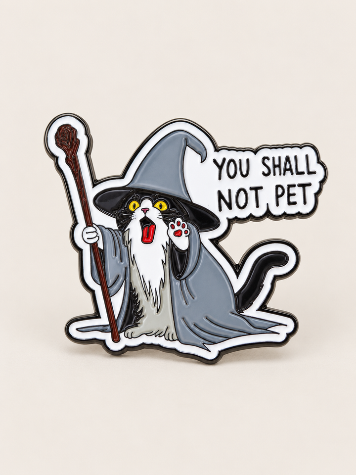 You Shall Not Pet Wizard Cat Pin shown on a warm neutral background