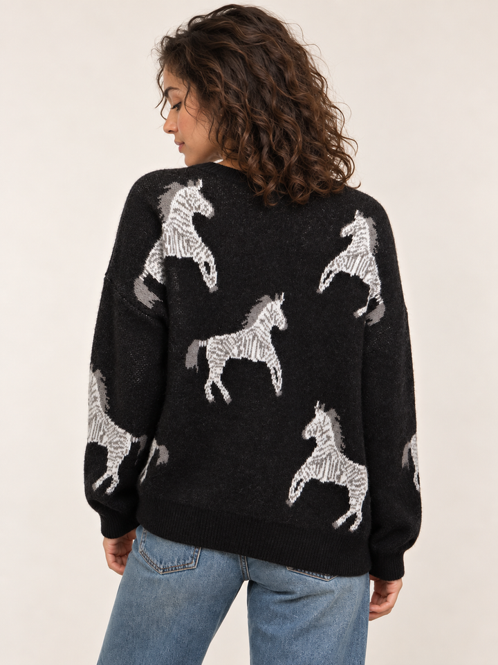 Model wearing Zebra Sweater Black, back view