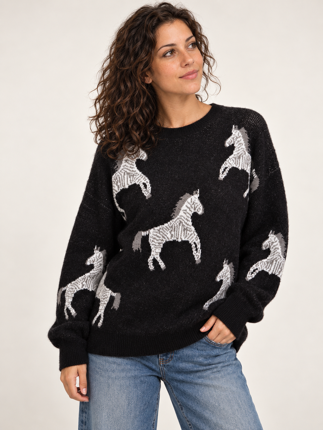 Model wearing Zebra Sweater Black, front view