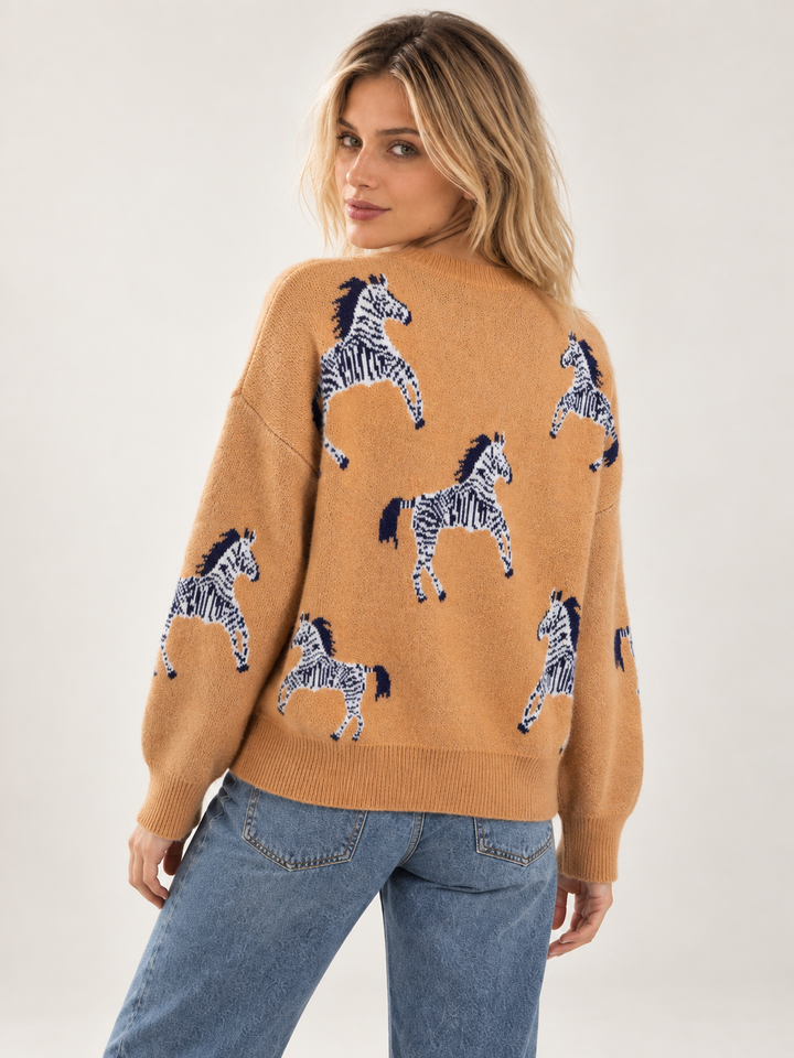 Back view of Zebra Sweater Tan on model